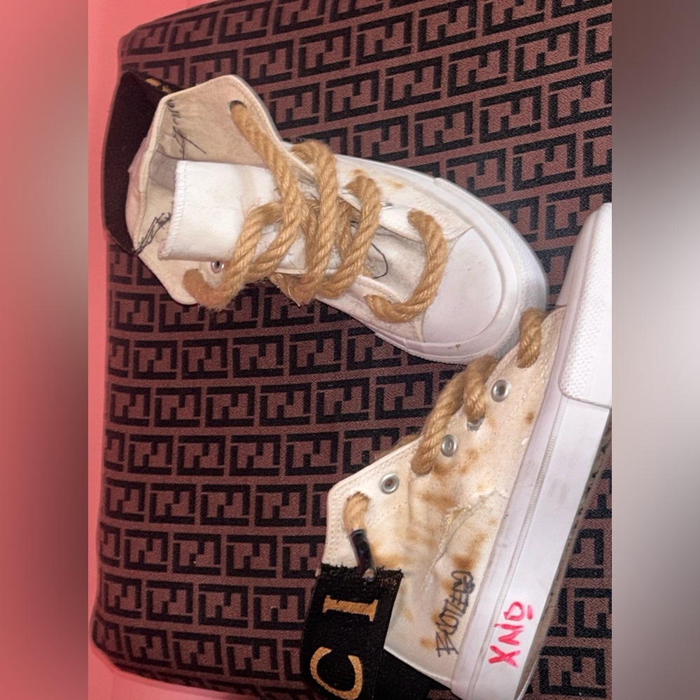 Canvas shoes that I used as a canvas and put my own take on the shoe.